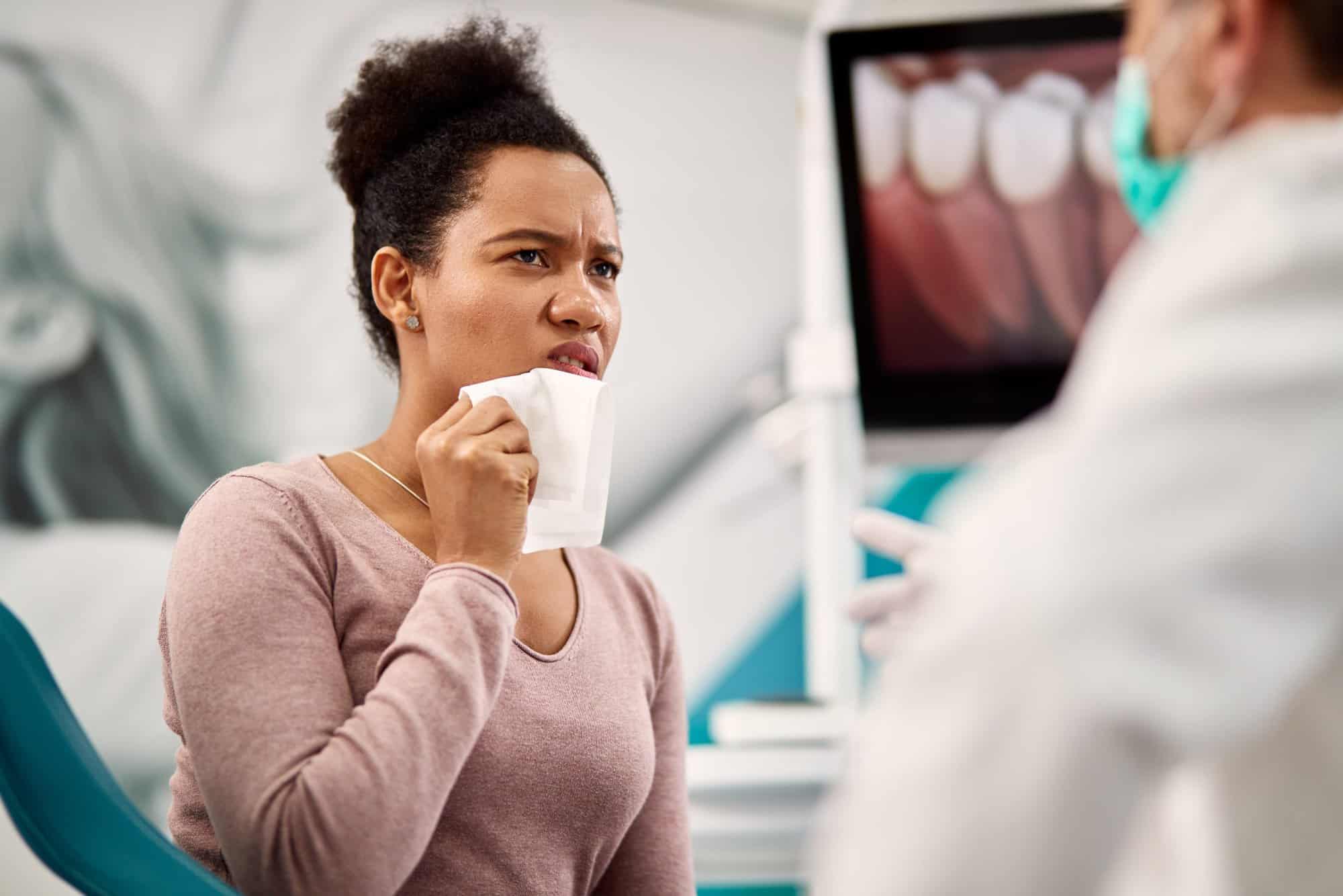 veneers-for-sensitive-teeth woman considering if veneers are safe for sensitive teeth